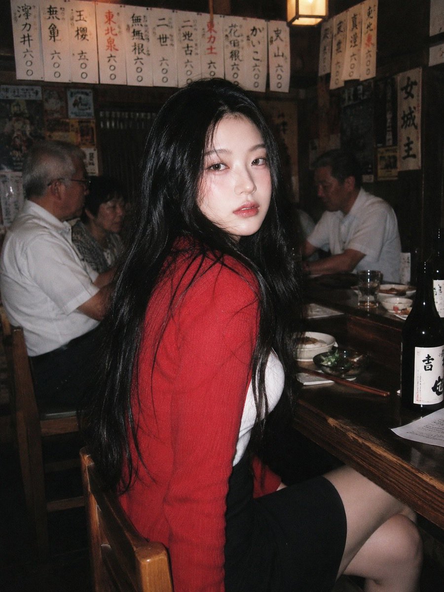 A 90s disposable-camera style flash snapshot taken inside a small, bus